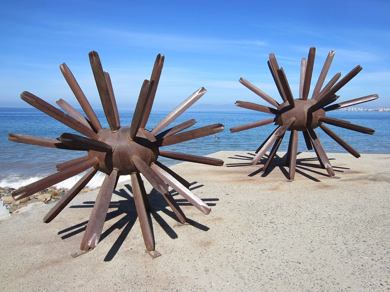 Spiky sea-urchin sculptures on the beach along the malecón in Puerto Vallarta.
