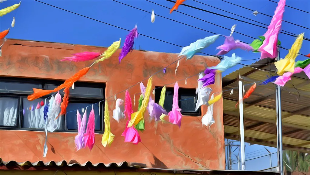 Papel picado over a colorful street in Querétaro, a day trip from Mexico City.