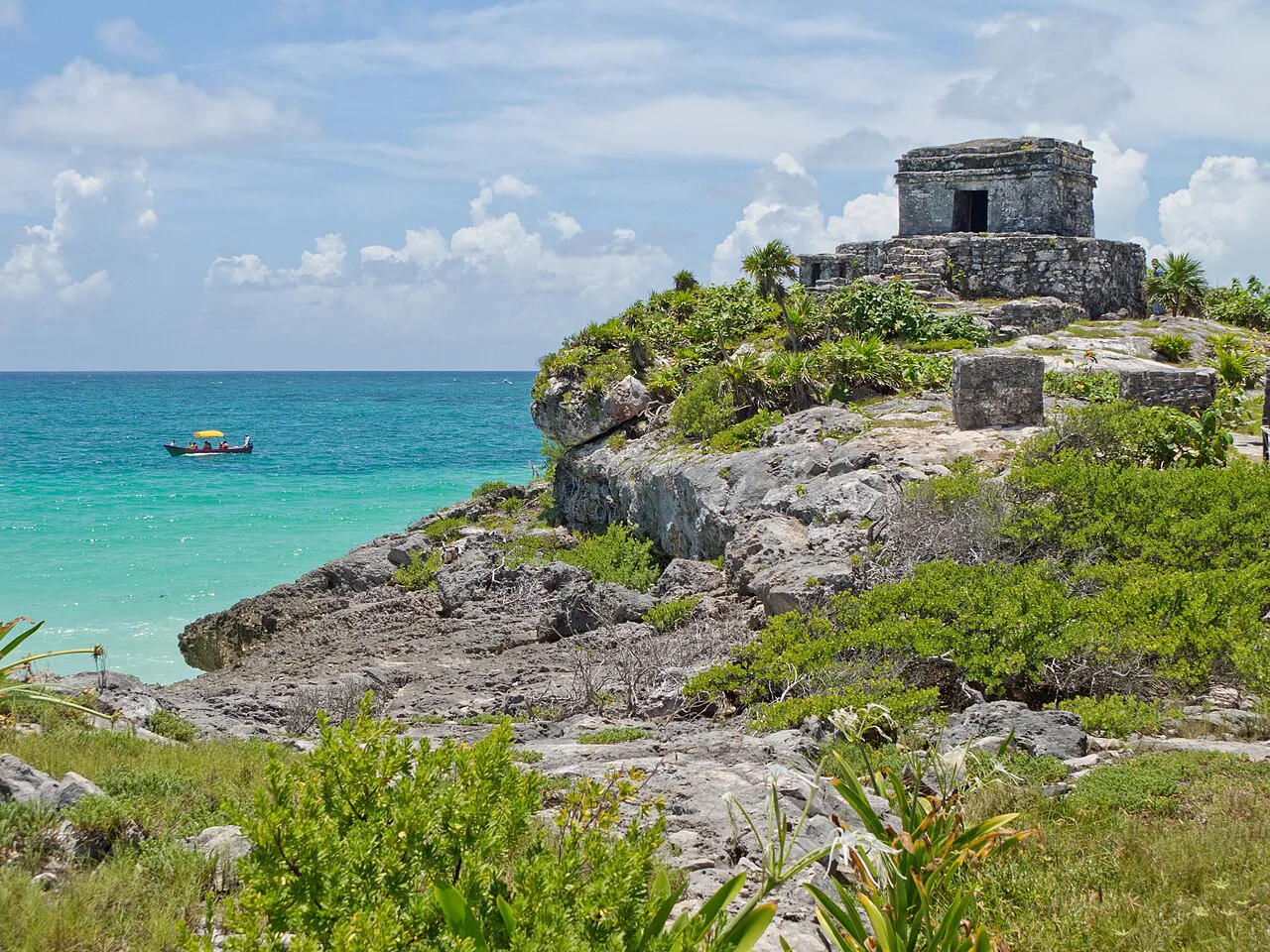 Tulum ruins on the clifftop above the Caribbean Sea.