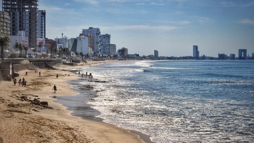 Beach and high-rise hotels along the shore in Mazatlán.