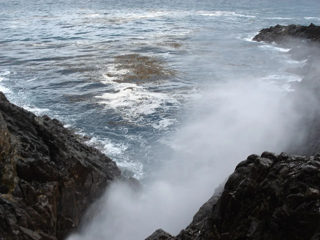 Waves surging into the rocky inlet at La Bufadora, south of Ensenada.