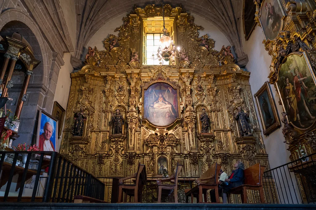 Gilded Baroque altarpiece inside Mexico City's Metropolitan Cathedral.