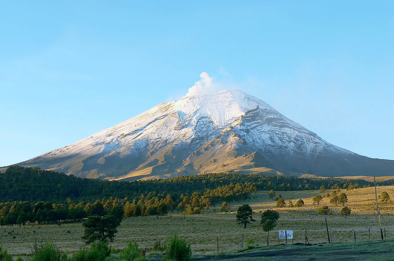 Snow-capped Popocatépetl volcano seen from Paso de Cortés in central Mexico.