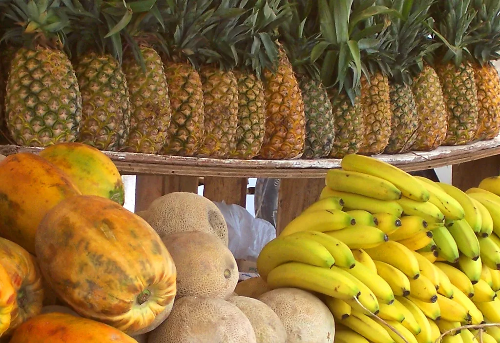 Pineapples, papayas and bananas at a fruit stall in Ensenada.