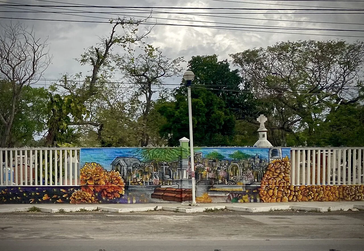 Painted mural wall at the cemetery in Playa del Carmen.