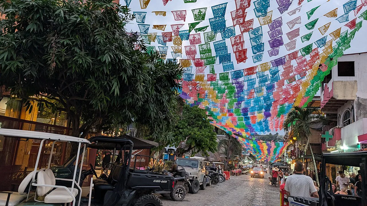 Papel picado strung over a street in Sayulita.